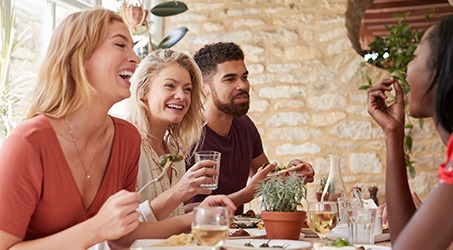 Group of friends enjoying a meal together