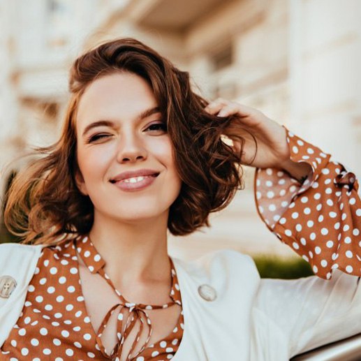 Woman enjoying the city and smiling